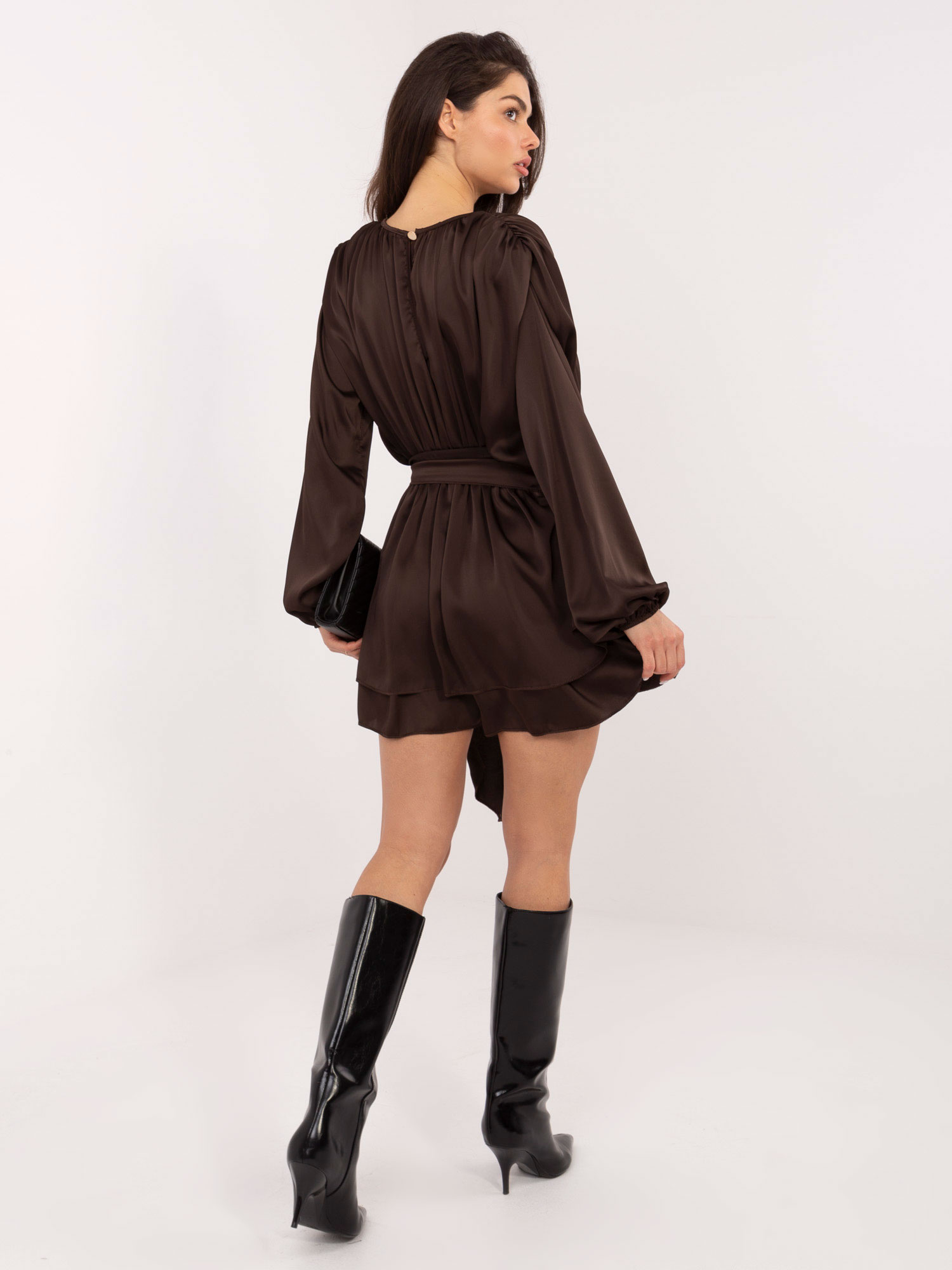 Chocolate short jumpsuit with a tie at the waist.