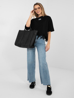 Czarna bluzka oversize z kwiatową aplikacją 