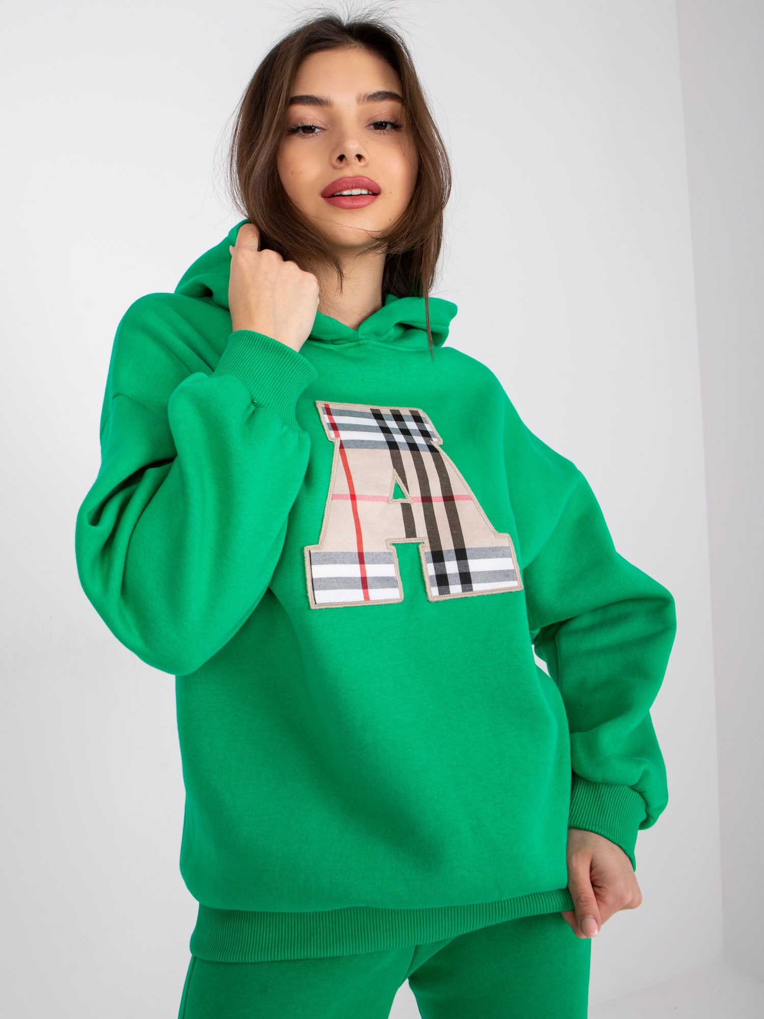 Green sweatshirt with patch and hood Felicja