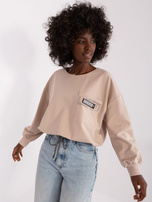 Hurt Beżowa krótka bluzka na co dzień ze ścigaczem