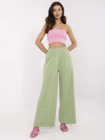 Pistacjowe damskie spodnie basic z gumką w pasie