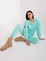 Hurt Mint velour set with a sweatshirt without a hood.
