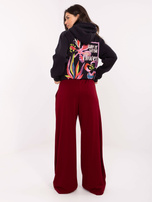 Burgundy palazzo sweatpants.