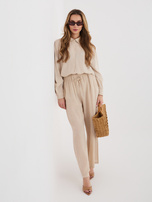 Beżowe letnie spodnie z kieszeniami 