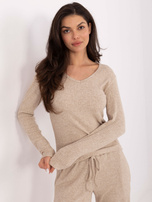 Beżowe prążkowane spodnie z wiązaniem 