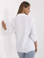 White women's button-up shirt made of muslin.