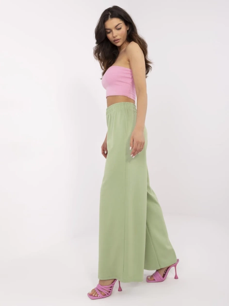 Pistacjowe damskie spodnie basic z gumką w pasie