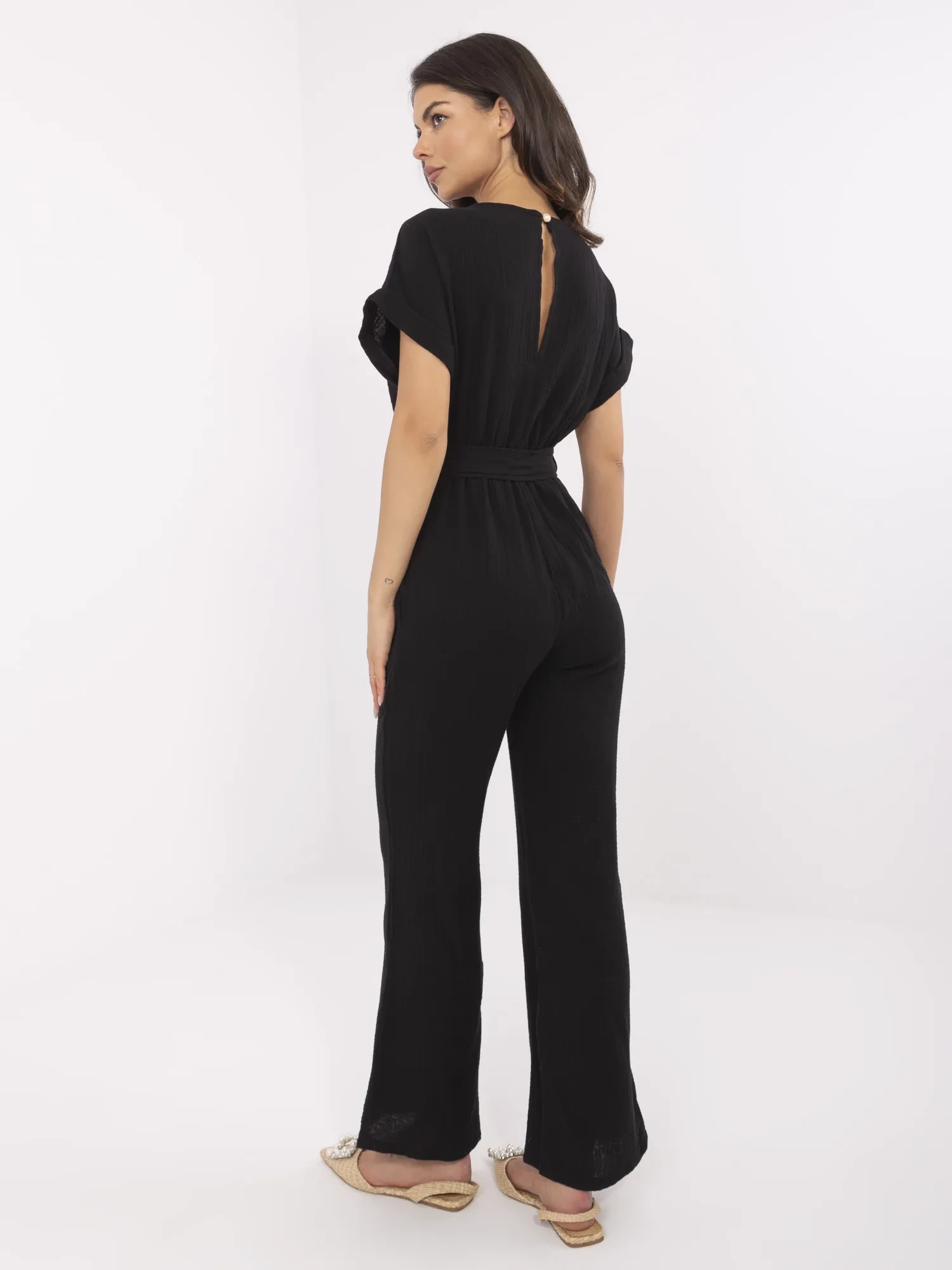 Black muslin jumpsuit with pockets.