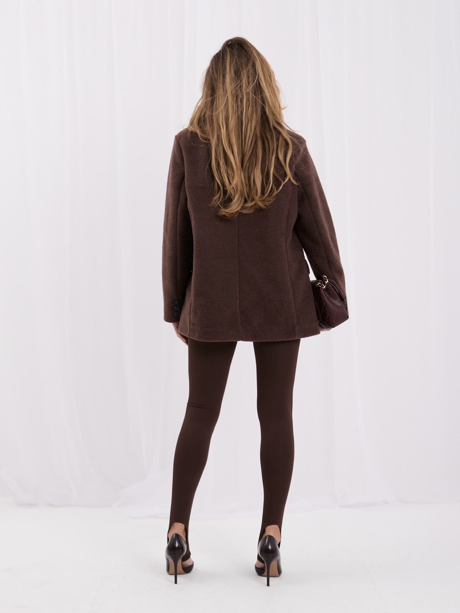 Braune glatte Leggings mit Ausschnitt für die Ferse.