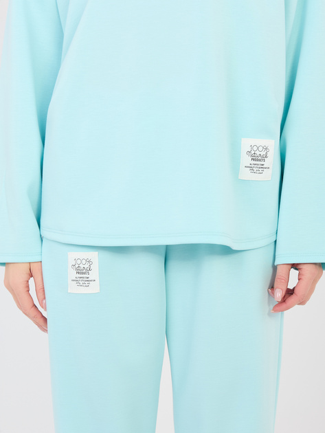 Miętowy komplet z przeszyciami na nogawkach RUE PARIS