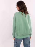 Hurt Pistacjowa dresowa bluza bez kaptura z haftem