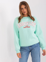 Hurt Miętowa damska bluza bez kaptura z napisem