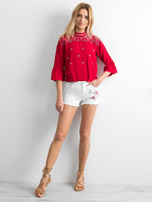 Białe szorty z motywem kwiatowym