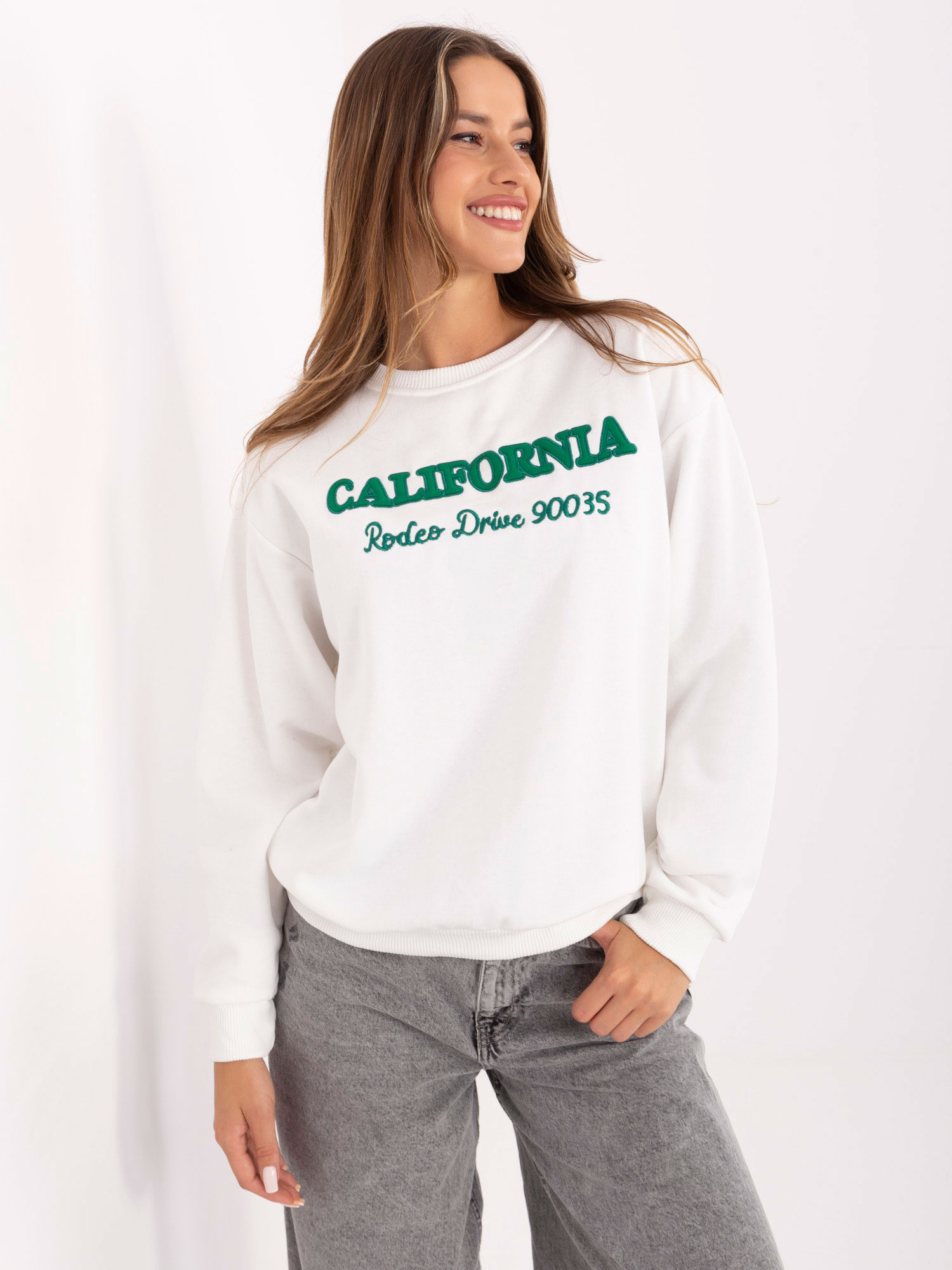 Wholesale Ecru women's loose sweatshirt without a hood with inscriptions.