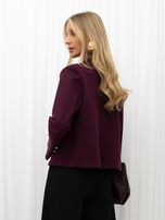 Burgundy vintage-style officer's jacket.