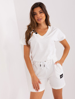 Wholesale Ecru tracksuit jumpsuit with short sleeves.