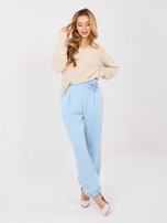 Pastelowy beżowy sweter oversize z dekoltem V