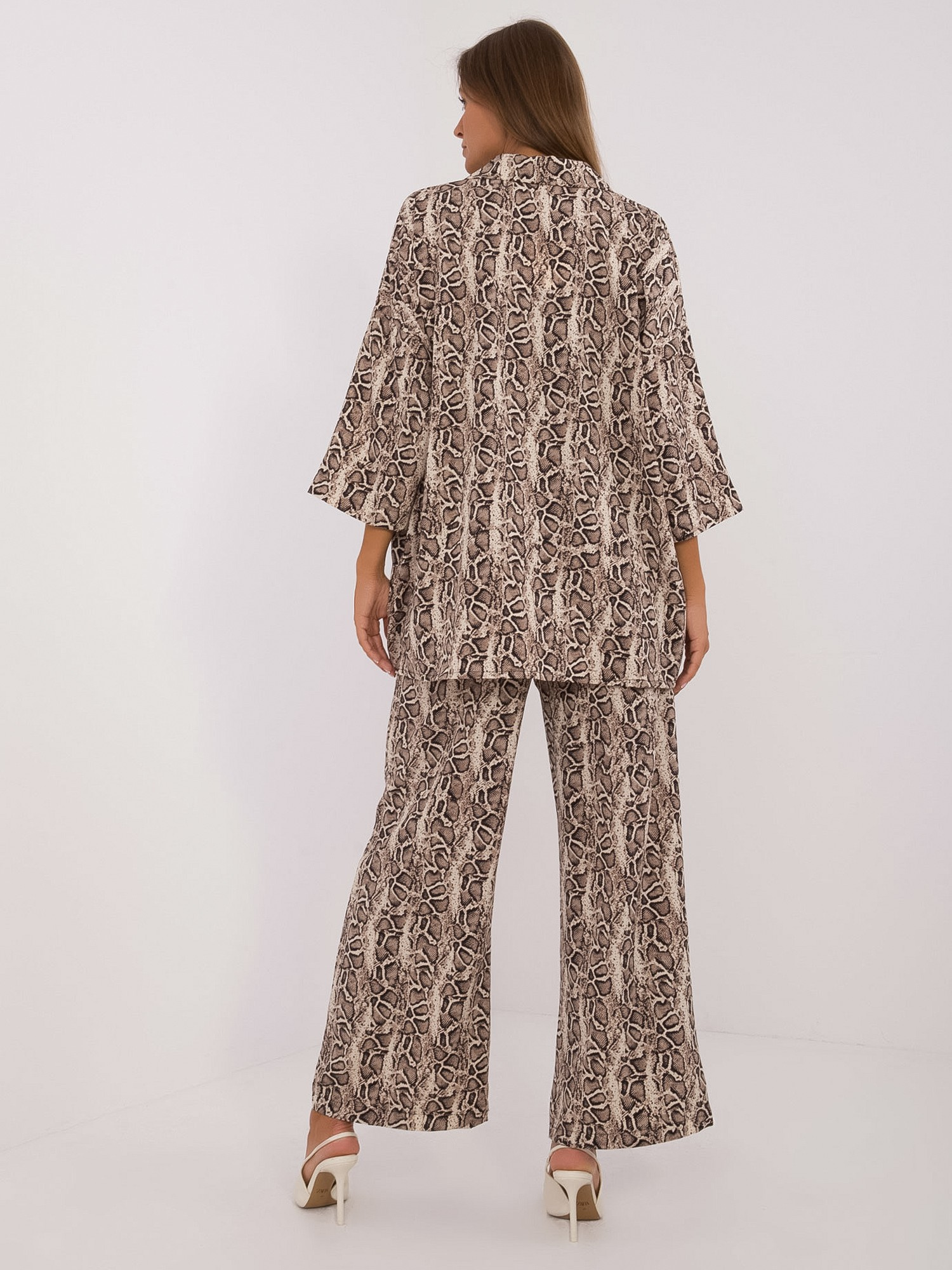 Beige-black two-piece set in animal pattern.