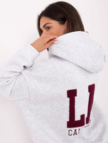 Jasnoszara dresowa bluza z napisem LA