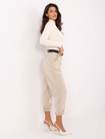 Jasnobeżowe spodnie z ekoskóry z kieszeniami