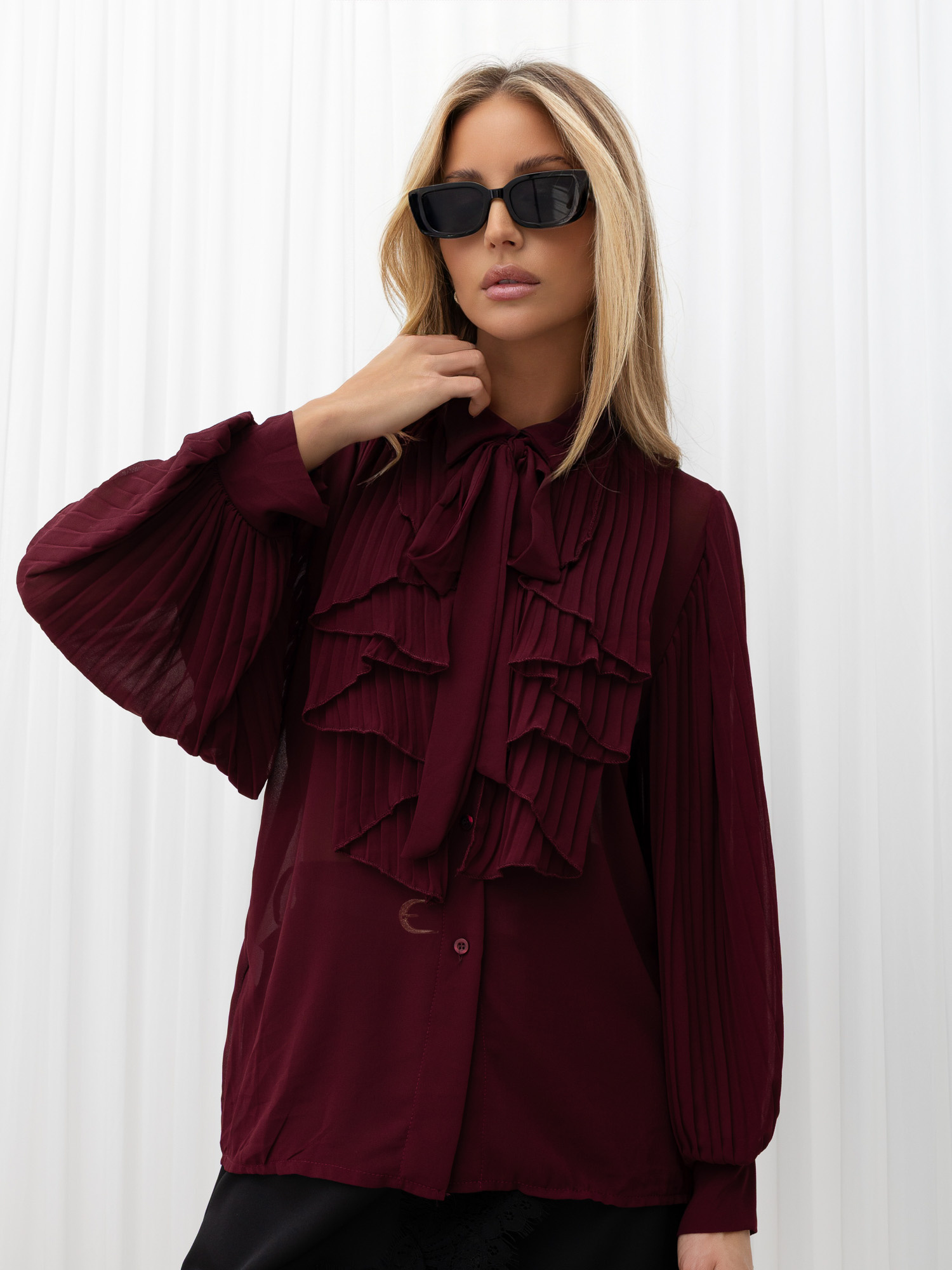 Burgundy elegant shirt with ruffles and pleating.