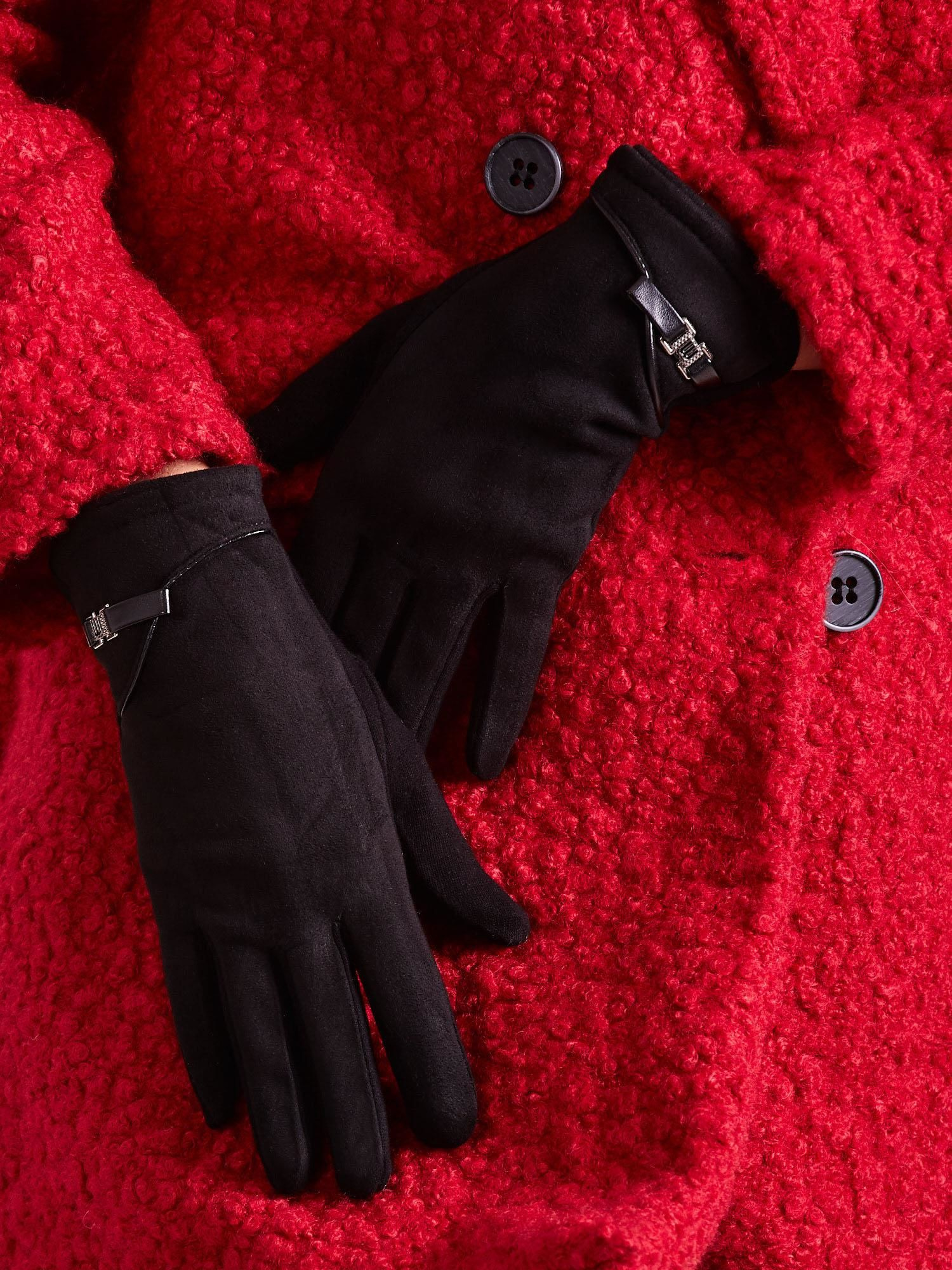 Schwarze elegante Damenhandschuhe.