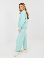 Miętowe jeansowe spodnie wide leg RUE PARIS 