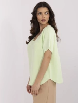 Pistacjowy sweter oversize z krótkim rękawem