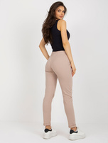 Hurt Beżowe damskie spodnie dresowe z prostą nogawką