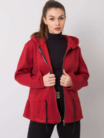 Audrey's burgundy coat