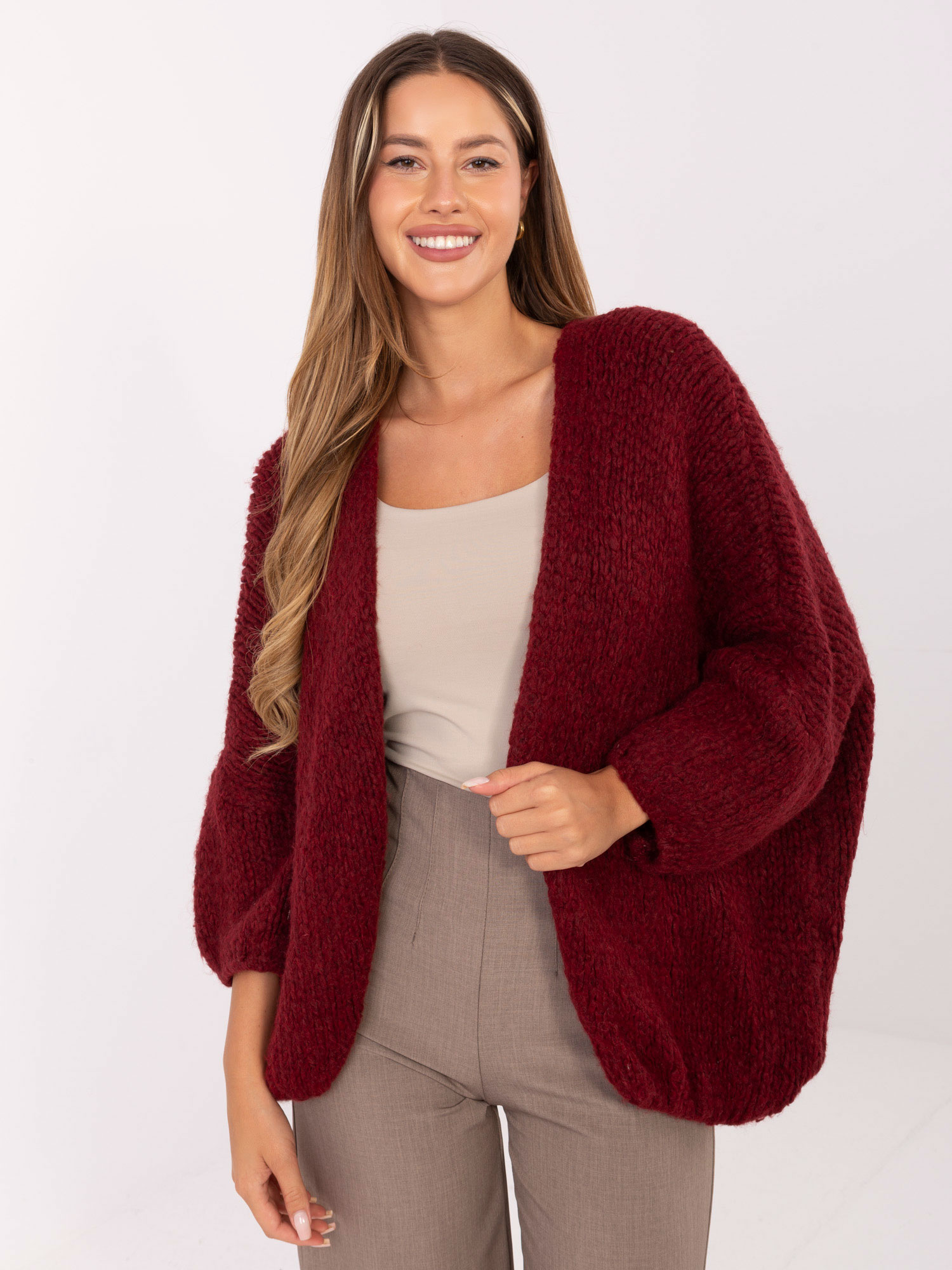 Burgundy cardigan with puff sleeves.