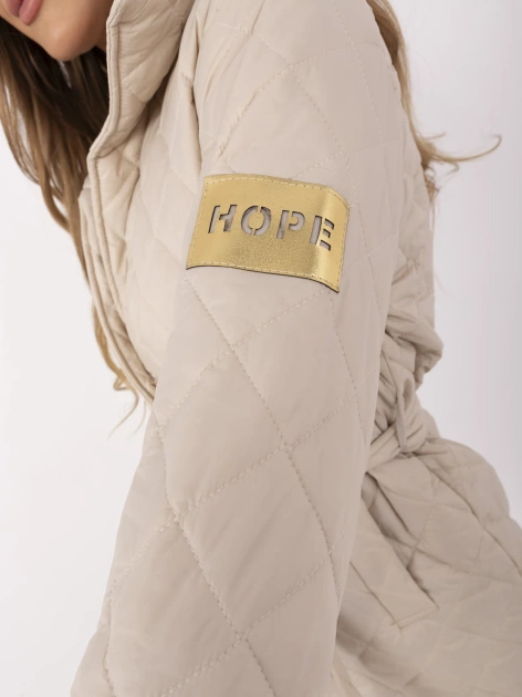 Hurt Beżowy przejściowy płaszcz damski z kieszeniami