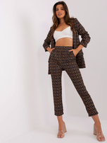 Hurt Czarno-camelowe materiałowe spodnie w napisy