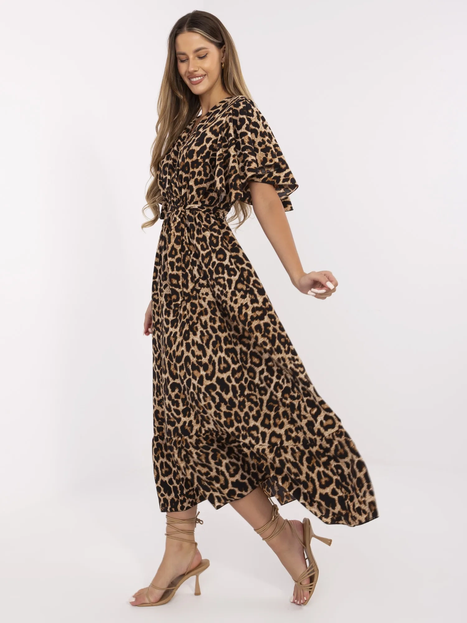 Camel and black flared dress with a belt.