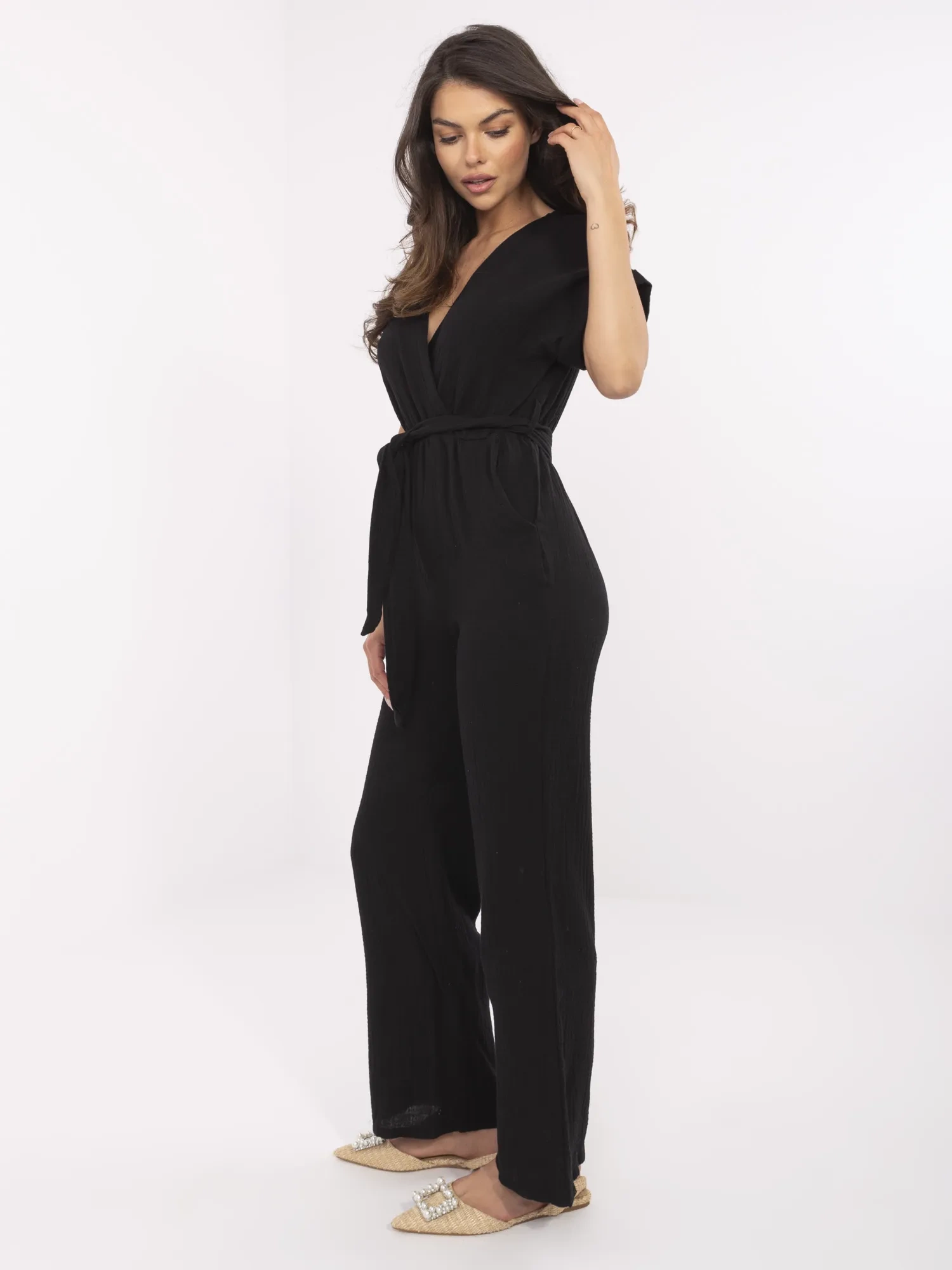 Black muslin jumpsuit with pockets.