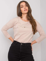 Helle beige Baumwollbluse mit dem Aufdruck Cantrice.