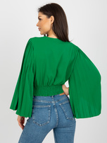 Hurt green envelope blouse with wide sleeves.