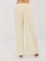 Jasnożółte szerokie spodnie na lato