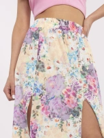 Jasnobeżowa midi spódnica z gumką w pasie