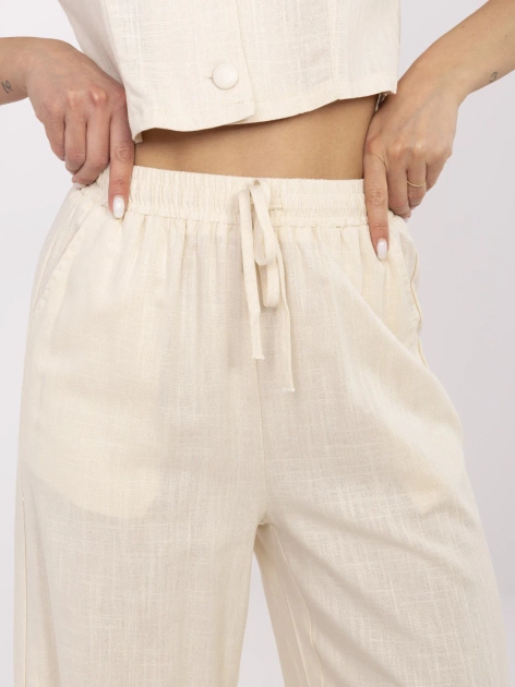 Jasnobeżowe zwiewne spodnie z dodatkiem lnu