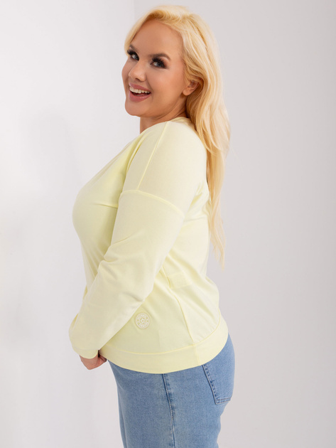 Hurtownia Jasnożółta bluzka plus size z naszywką