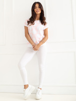 Brzoskwiniowa bluzka w geometryczny wzór