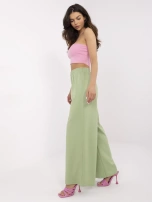 Pistacjowe damskie spodnie basic z gumką w pasie