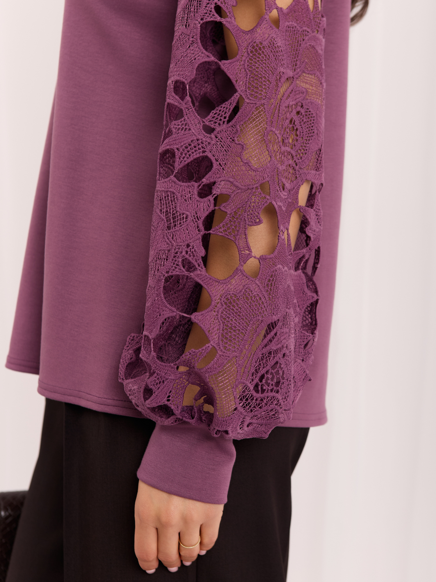 Purple elegant blouse with puff sleeves.