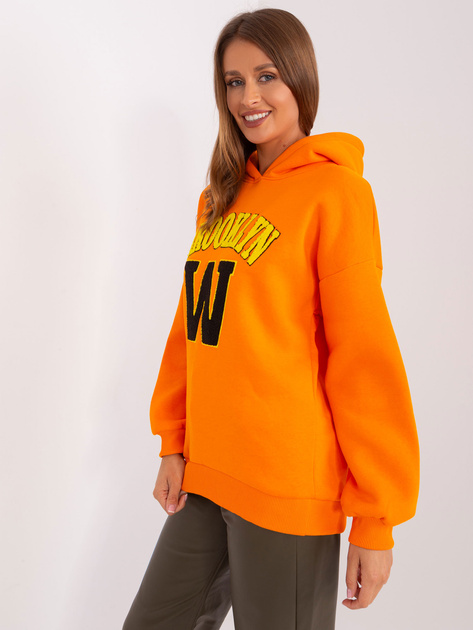 Hurt Pomarańczowa dresowa bluza z kapturem i naszywką