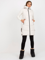 Hurtownia Kremowa długa kamizelka puchowa z kapturem