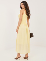 Light yellow flared cotton dress.