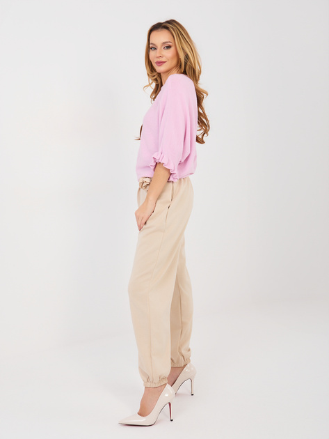 Beżowe dresowe spodnie z miękkiego materiału