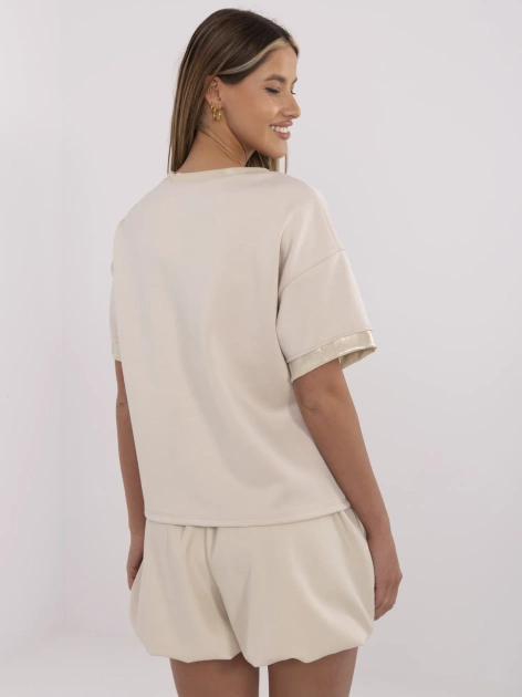 Beżowa damska bluzka z nadrukiem Rzymu