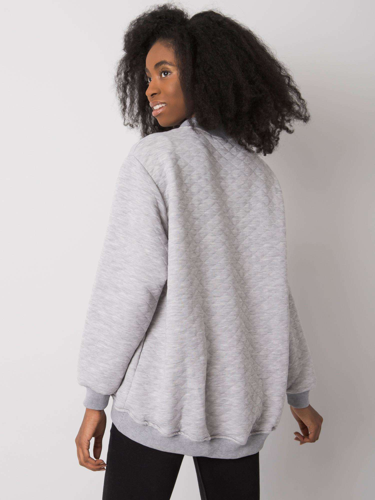 Gray quilted sweatshirt.